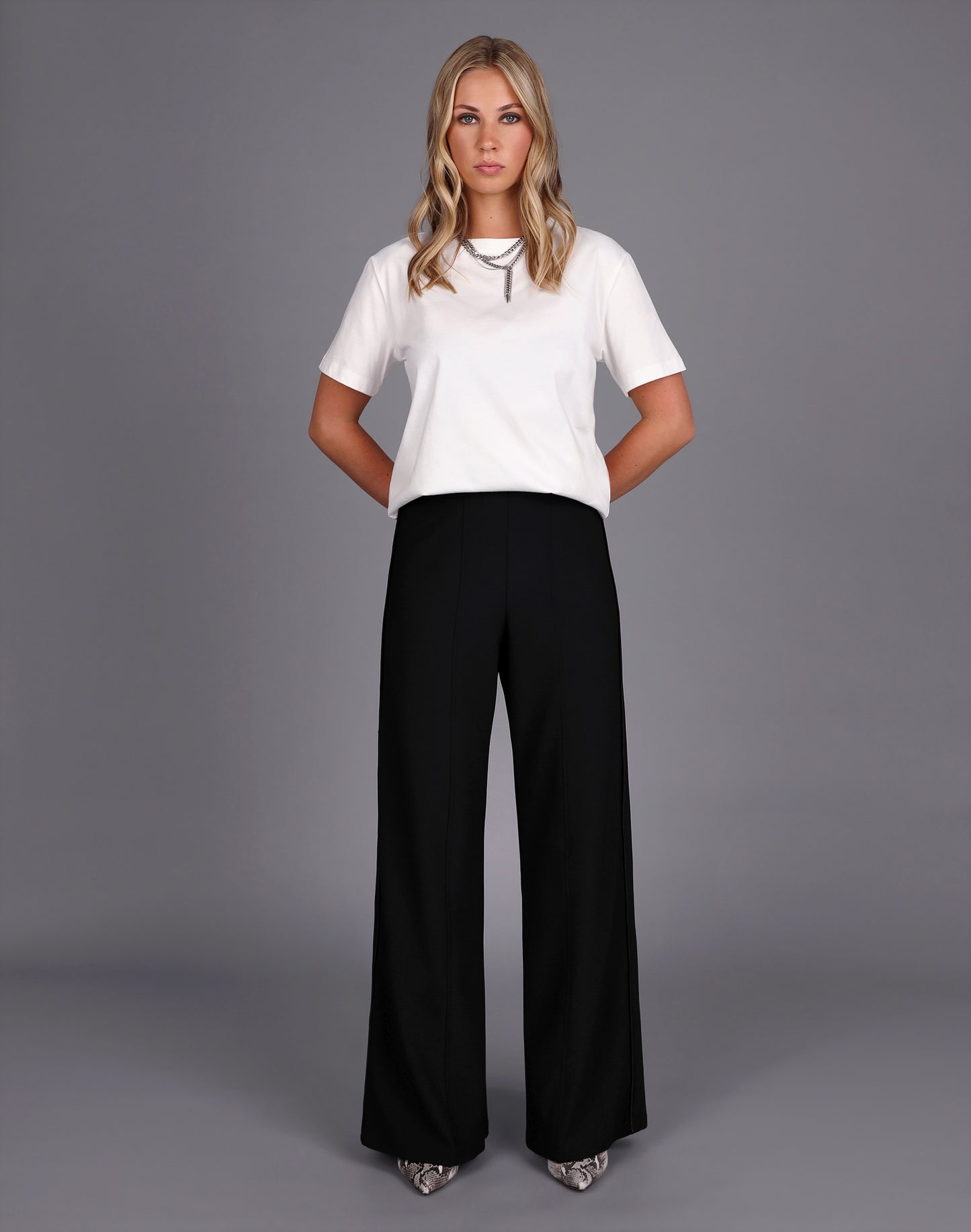 
                  
                    WIDE LEG KNIT TUX PANT -BLACK
                  
                