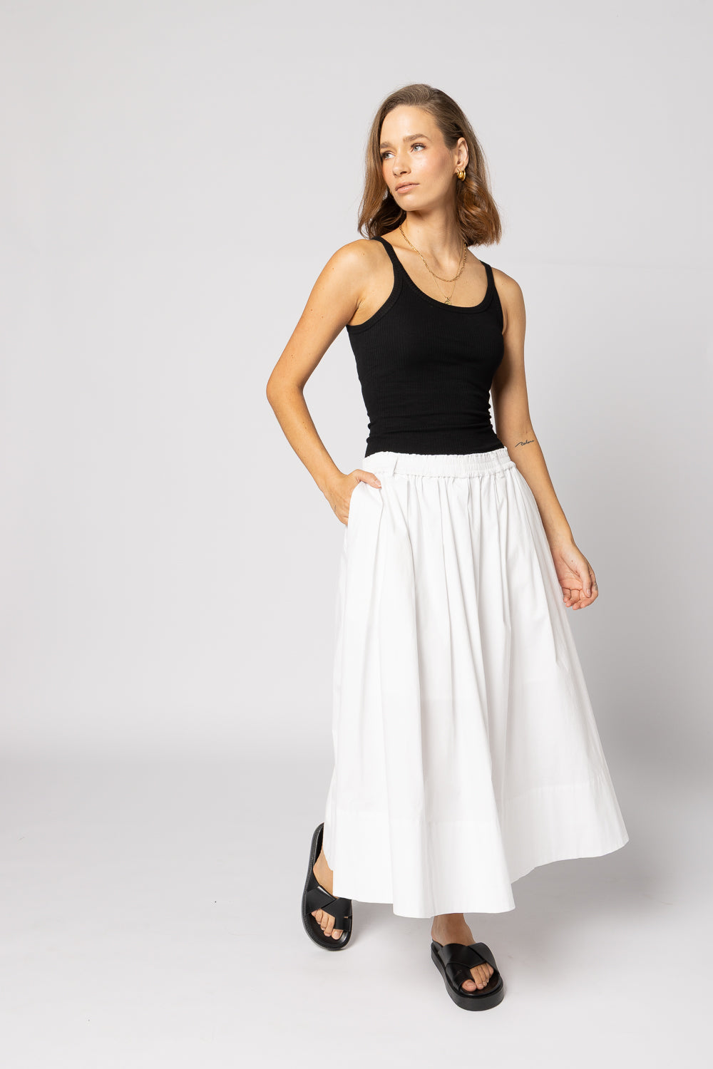 
                  
                    DIRECTION SKIRT-WHITE
                  
                