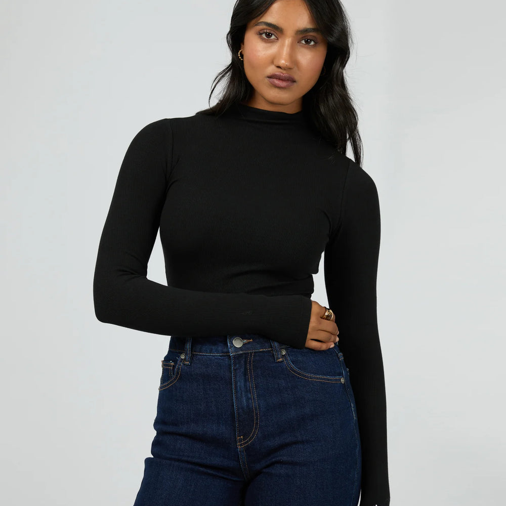 
                  
                    Icon Mock Neck L/S Top Black
                  
                