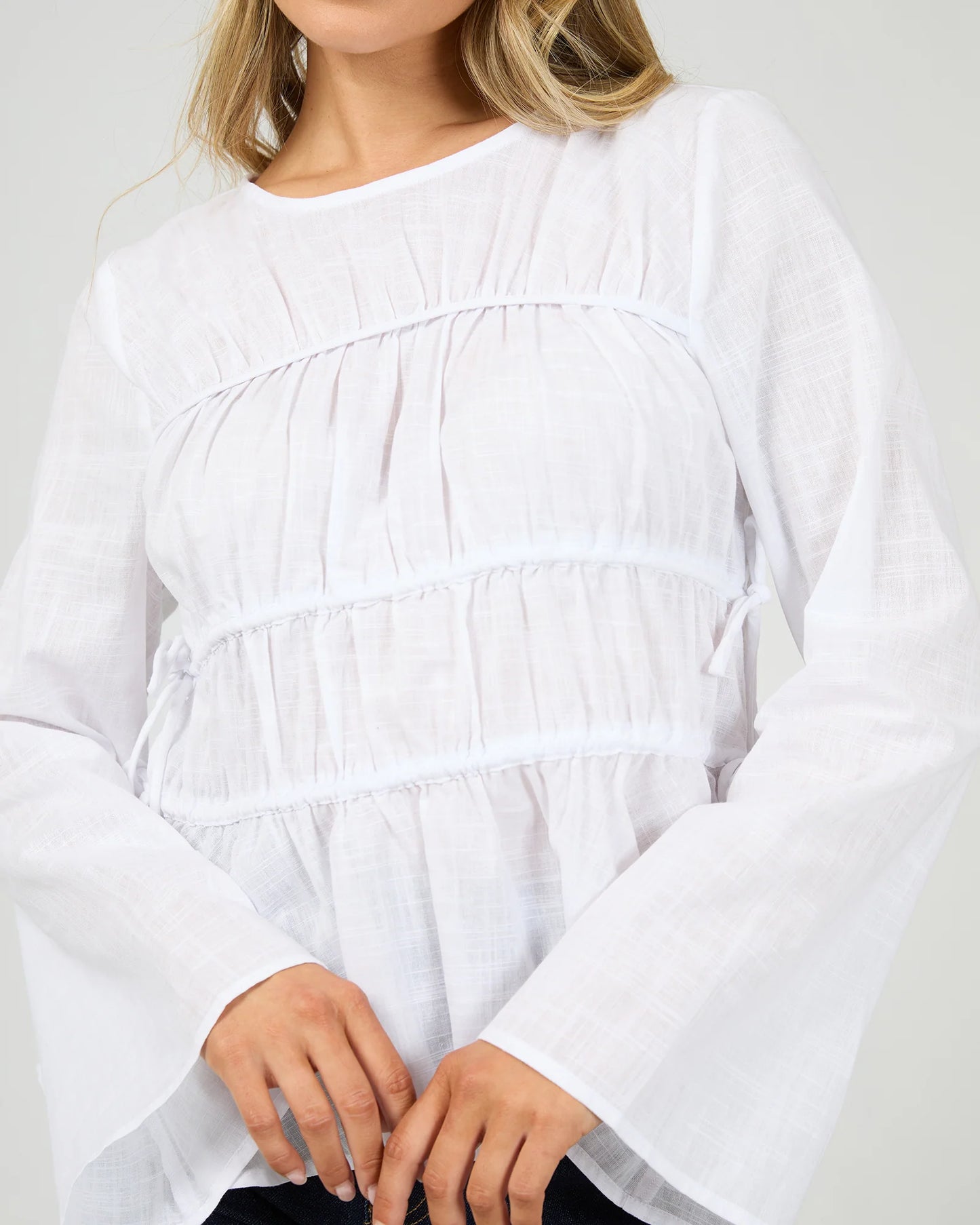 
                  
                    ALL ABOUT LOU LOU TIE LS TOP-White
                  
                