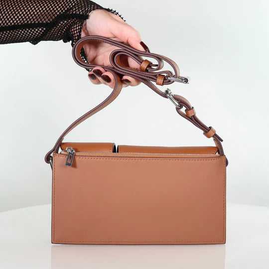 
                  
                    The Pocket Rocket Tan
                  
                