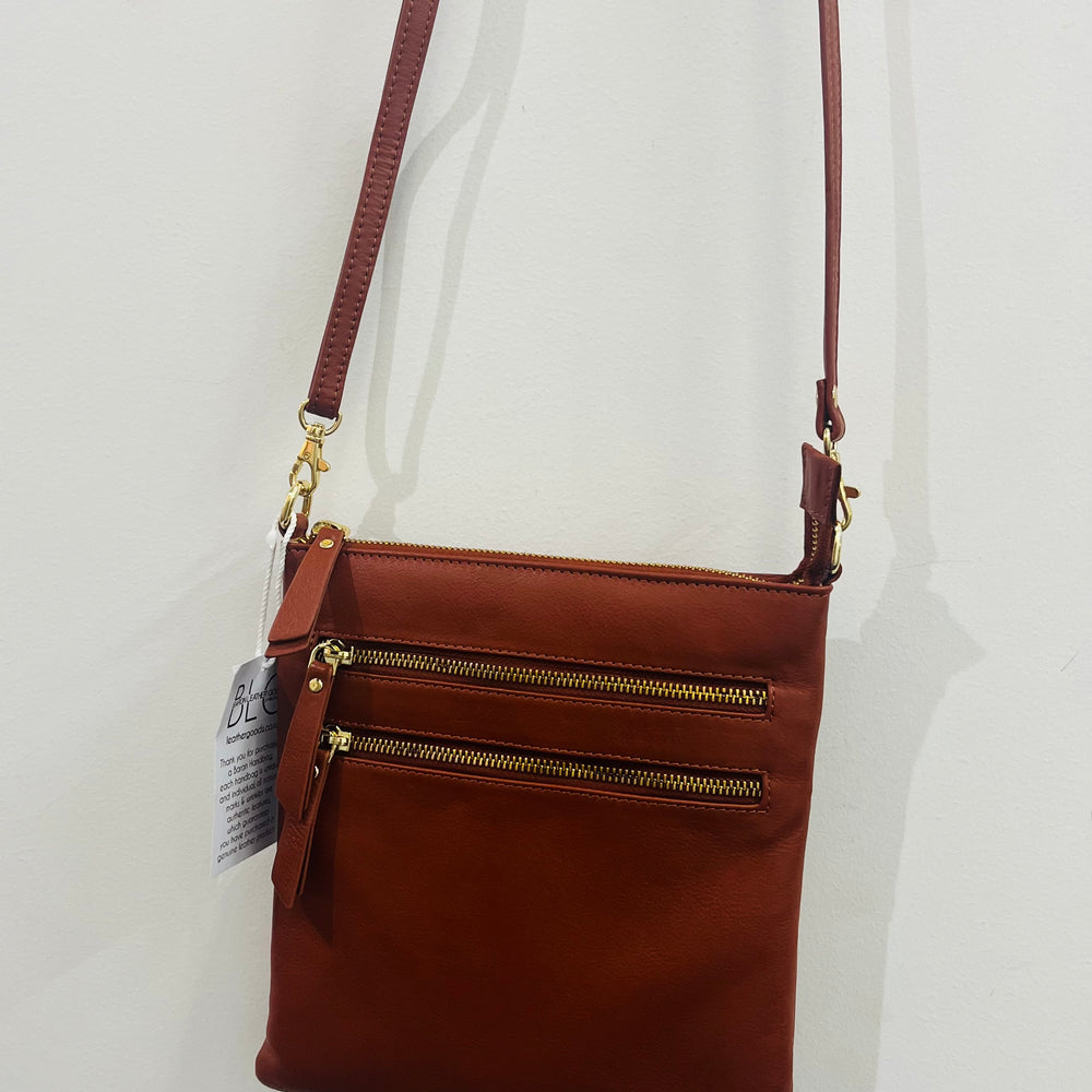 
                  
                    Slim line crossbody bag -Caramel
                  
                