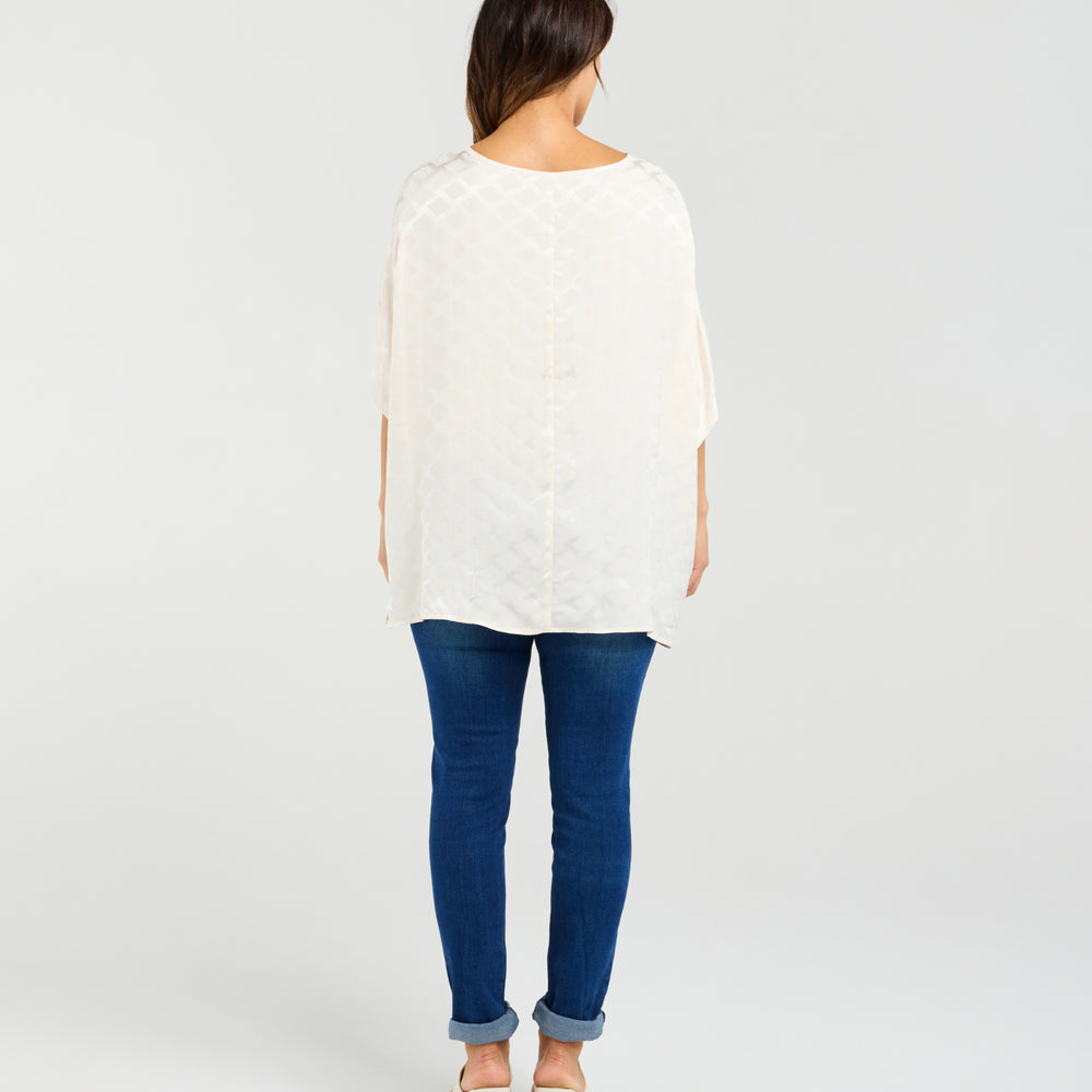 
                  
                    Clara Top-White
                  
                