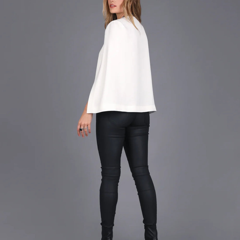 
                  
                    Layla Cape
                  
                