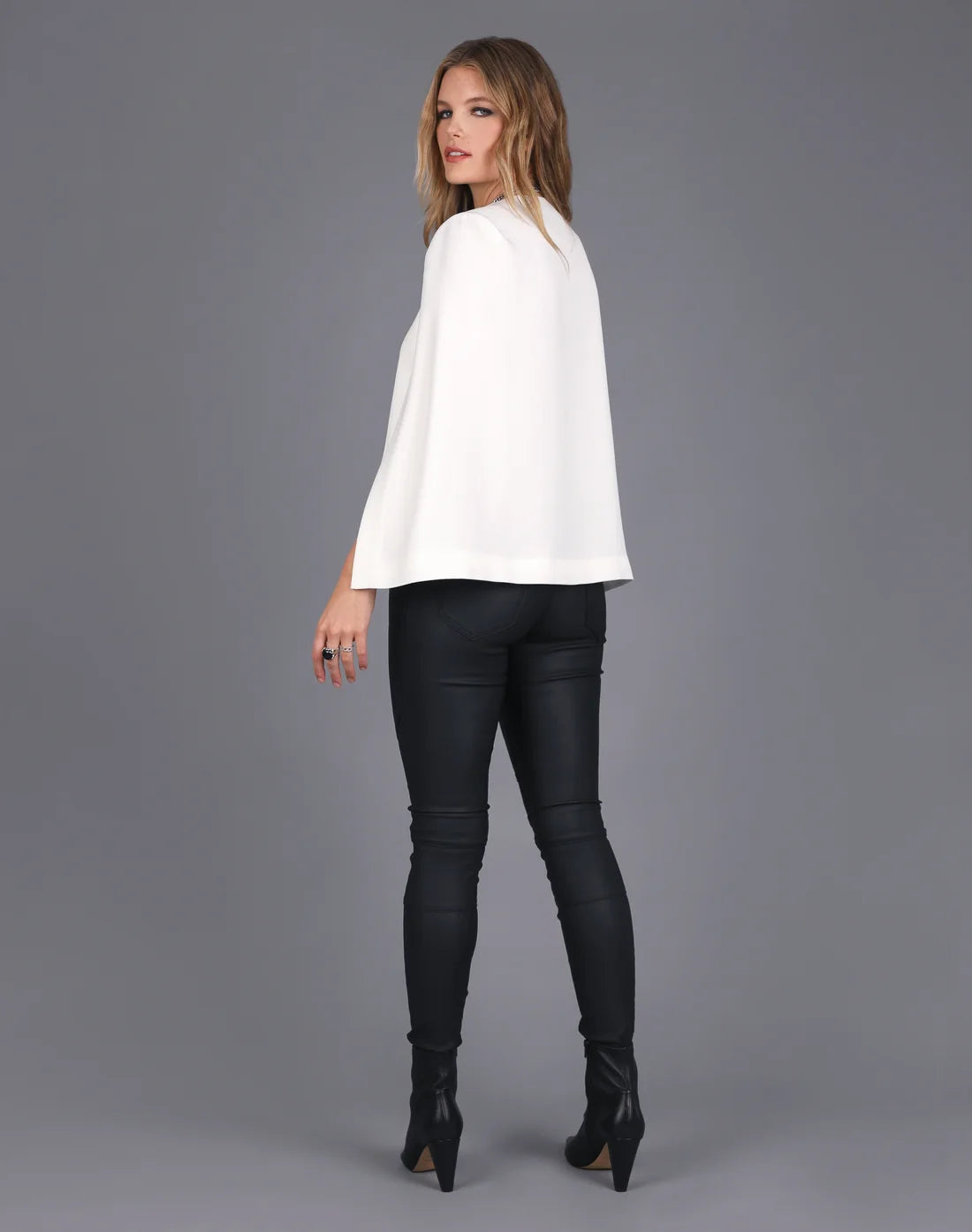 
                  
                    Layla Cape
                  
                